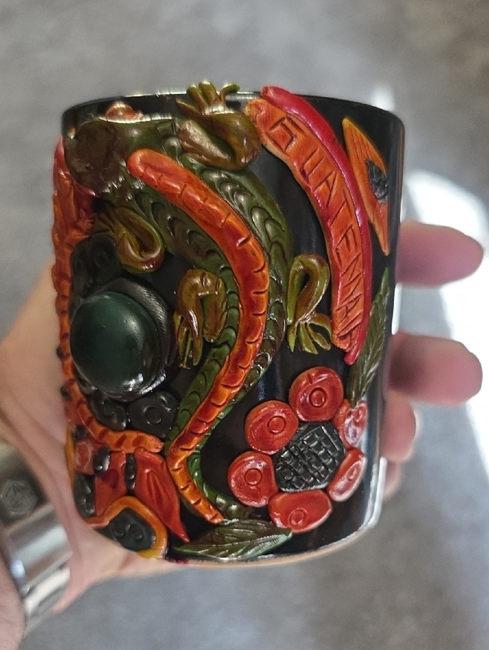 Custom Artist Mug with raised iguana and floral detailing from Guatemala